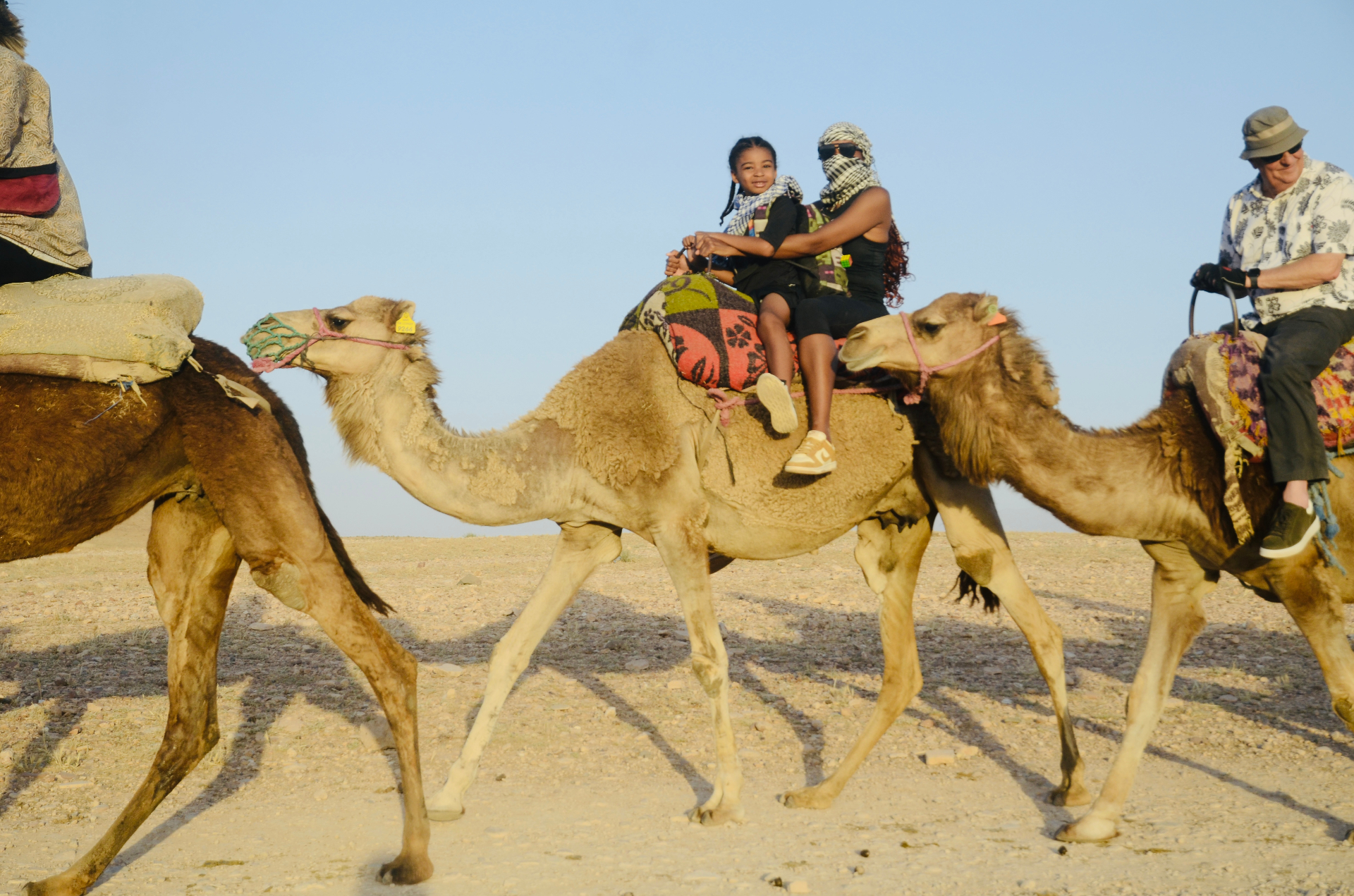 Amber and her son on a camel ride in Marrakech